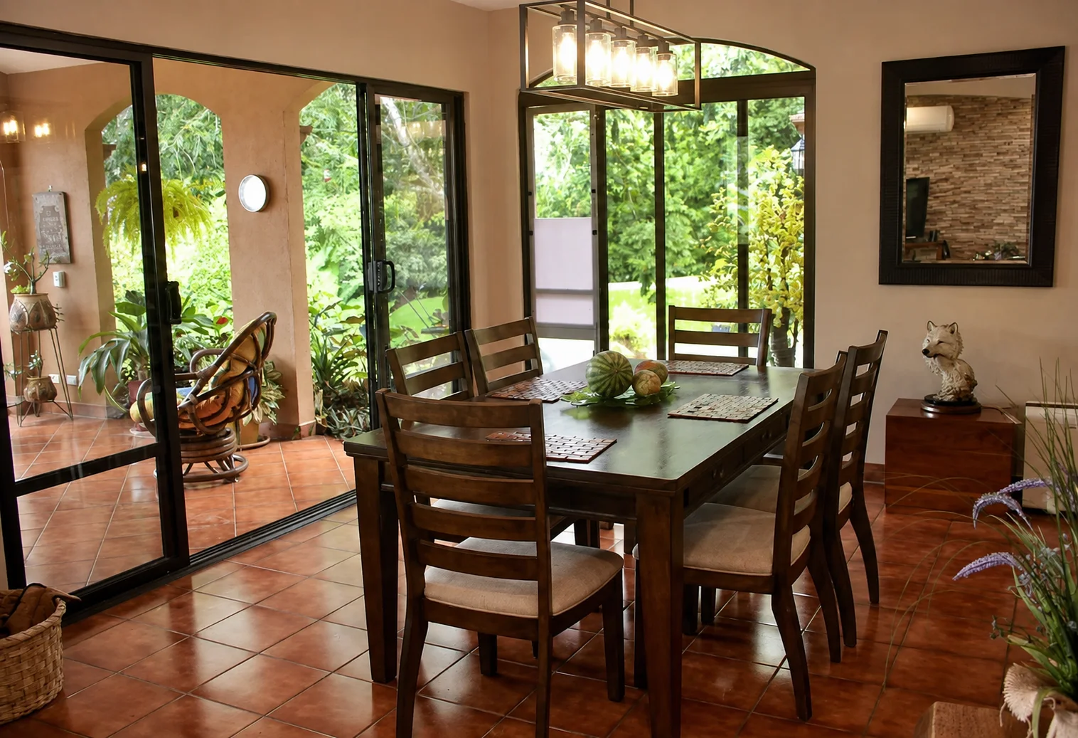 Dining room opening onto the covered terrace