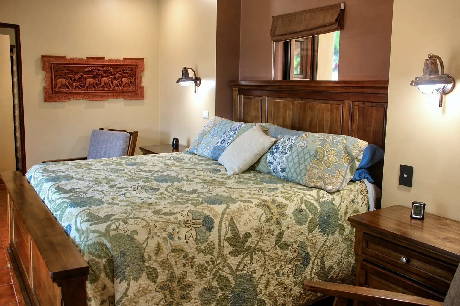 Bedroom with patterned quilt